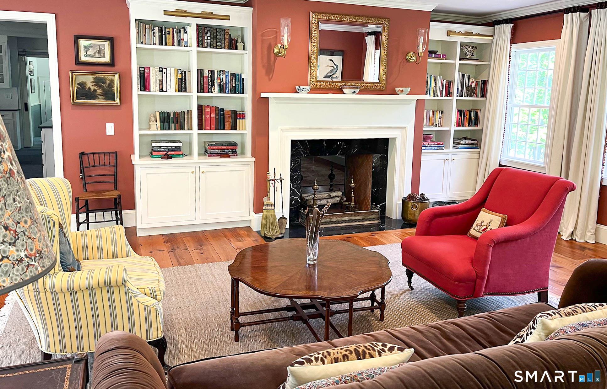 85 Gellert Road Hillsdale, NY 12529 - Photo 9 of 22 a living room with furniture fireplace and a large window