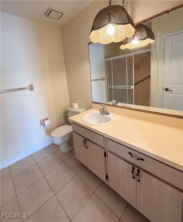 7280 Pebble Beach Road Fort Myers, FL 33967 - Photo 11 of 15 a bathroom with a sink a toilet and a mirror