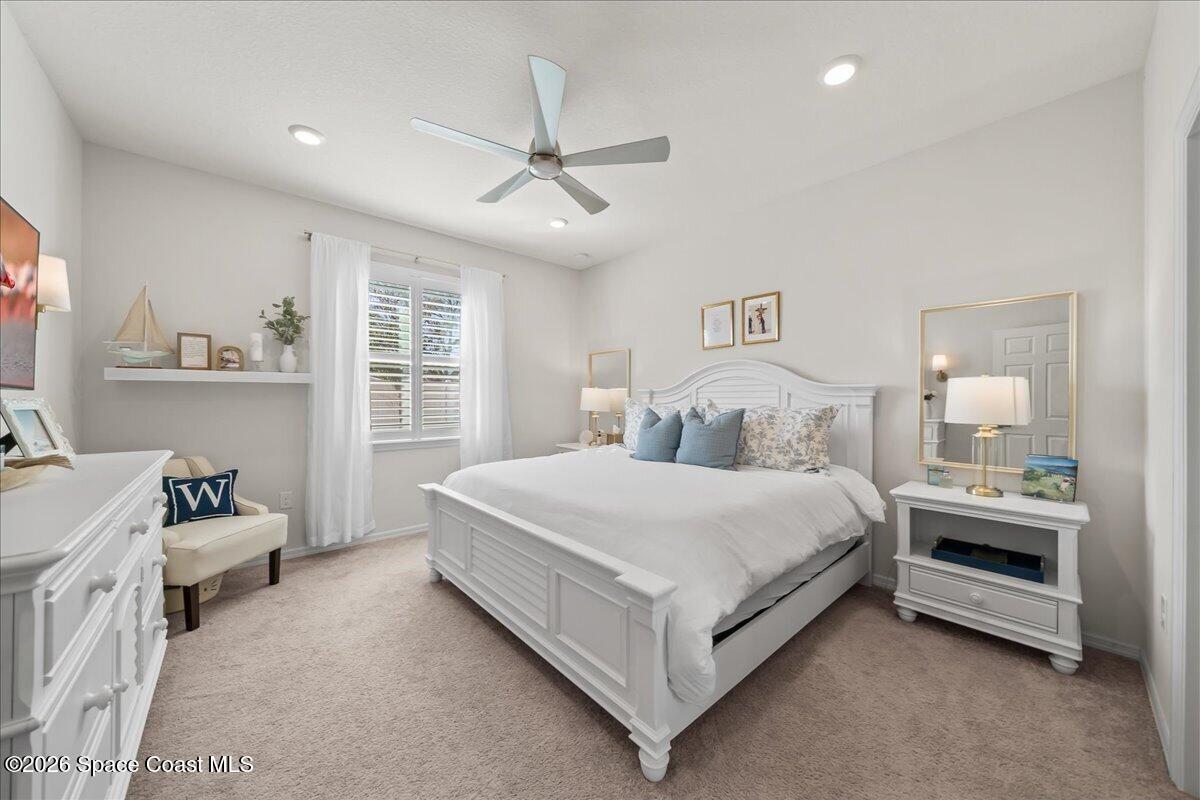 881 Covington Court Rockledge, FL 32955 - Photo 17 of 30 a bed room with a bed and a window