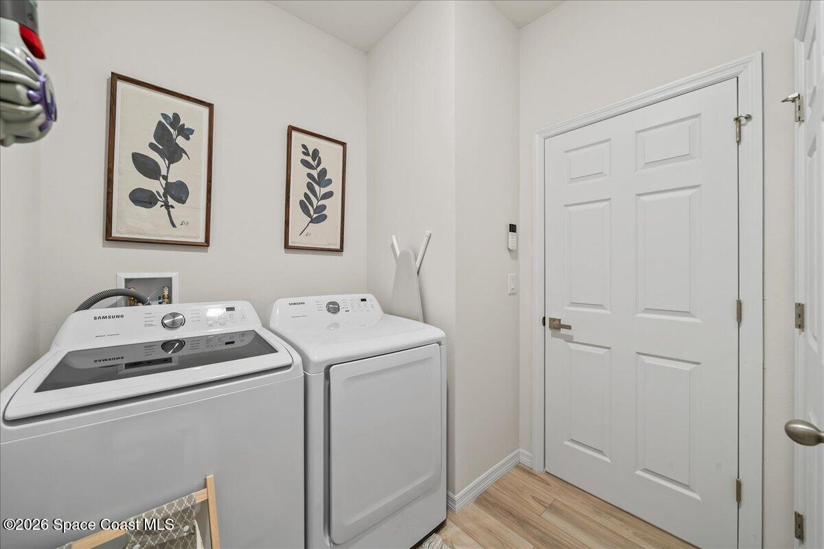 881 Covington Court Rockledge, FL 32955 - Photo 24 of 30 a room with storage and utility