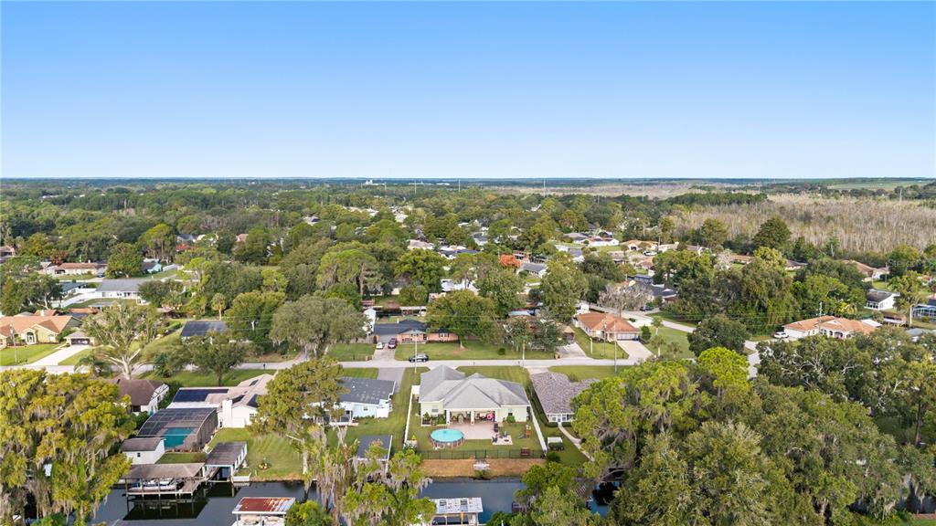 35638 Calla Court Leesburg, FL 34788 - Photo 2 of 44 an aerial view of residential building and car parked