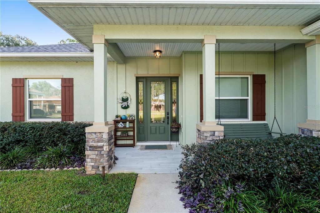 35638 Calla Court Leesburg, FL 34788 - Photo 6 of 44 a front view of a house with a yard