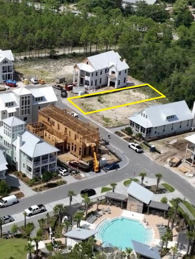 12 Climbing Rose Way Santa Rosa Beach, FL 32459 - Photo 2 of 3 an aerial view of a house with a swimming pool yard and outdoor seating