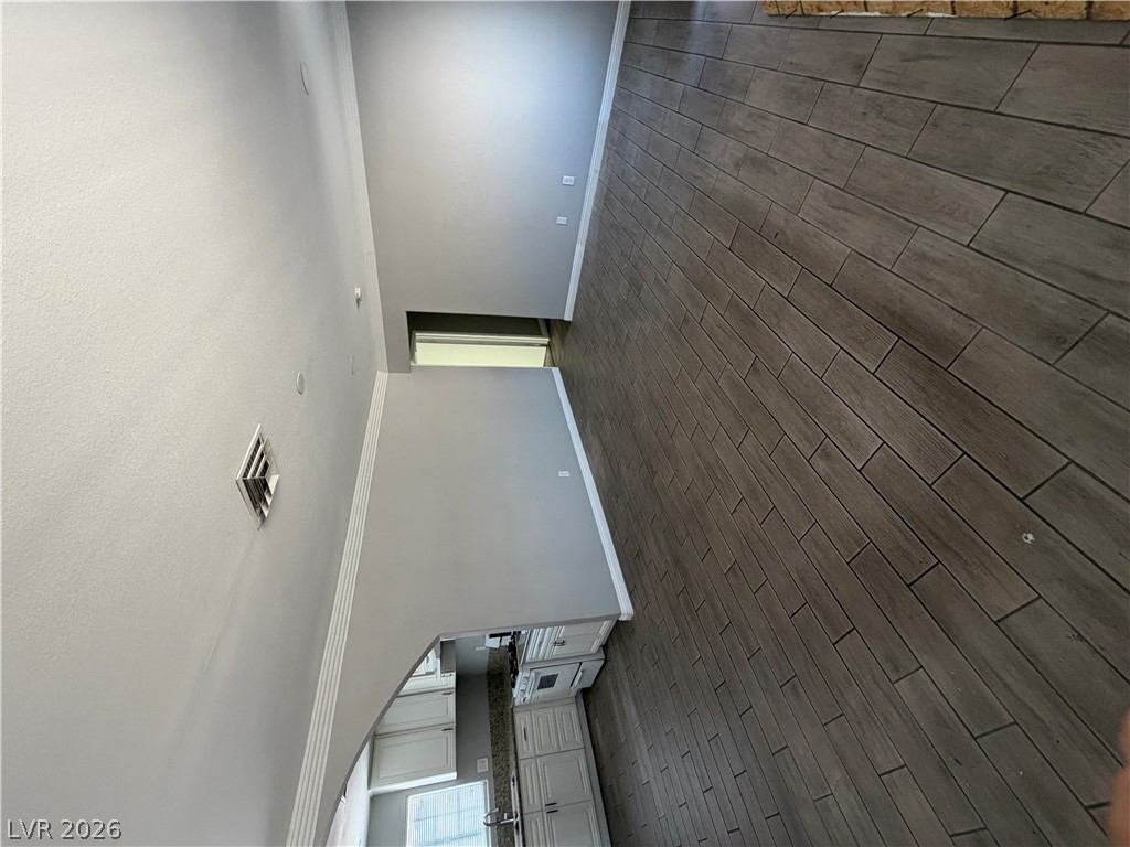 2820 South Sandhill Road, Unit A Las Vegas, NV 89121 - Photo 8 of 26 Clean lines and a spacious layout define this appealing, well-lit interior with durable flooring.