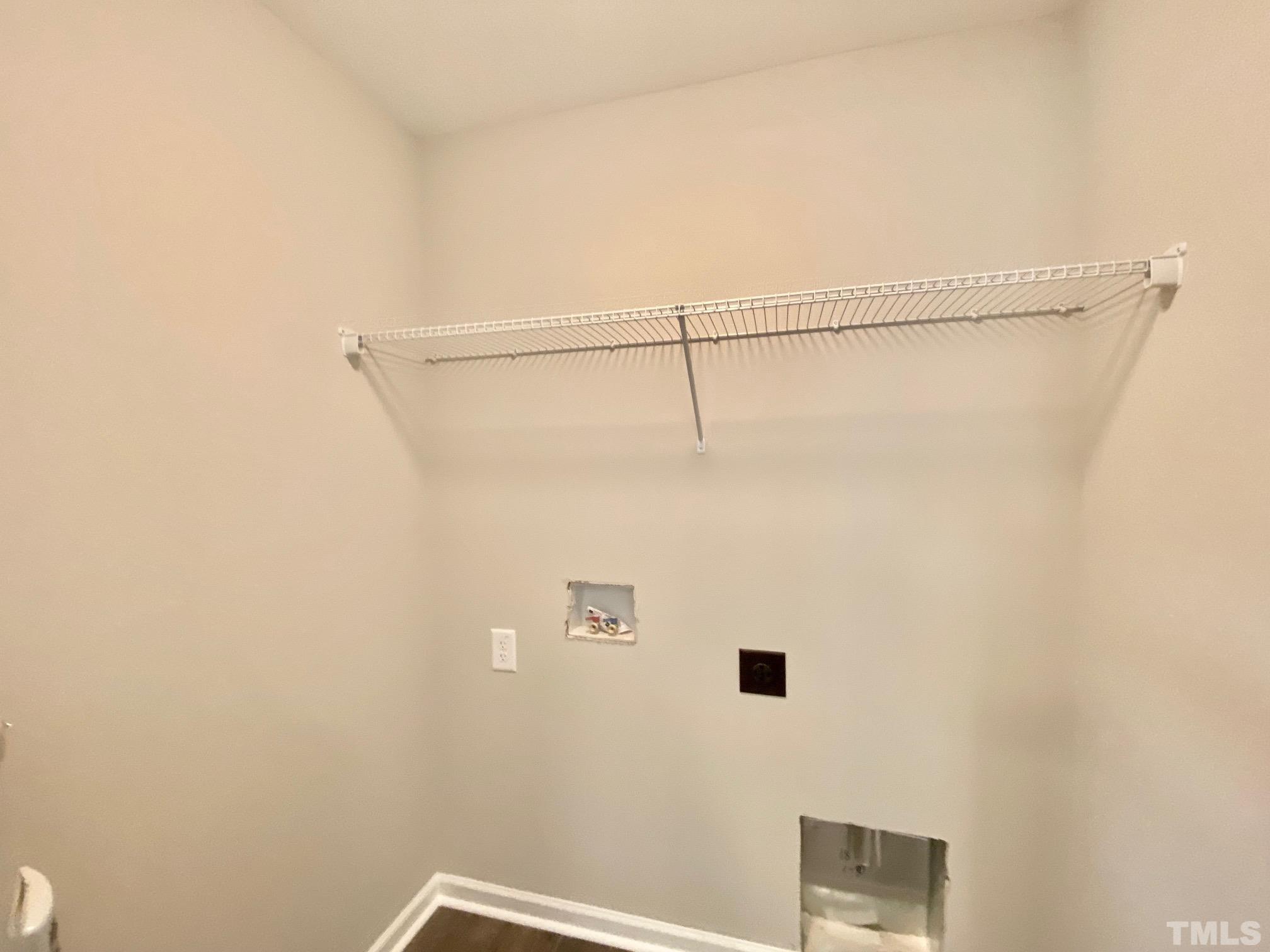 136 Mamie Road Benson, NC 27504 - Photo 17 of 32 a view of small space with racks on the wall