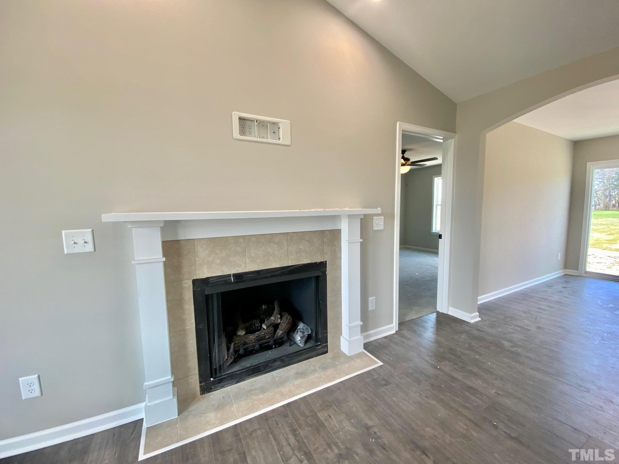 136 Mamie Road Benson, NC 27504 - Photo 8 of 32 a living room with a fireplace