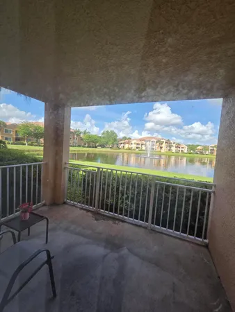 a view of a porch with furniture