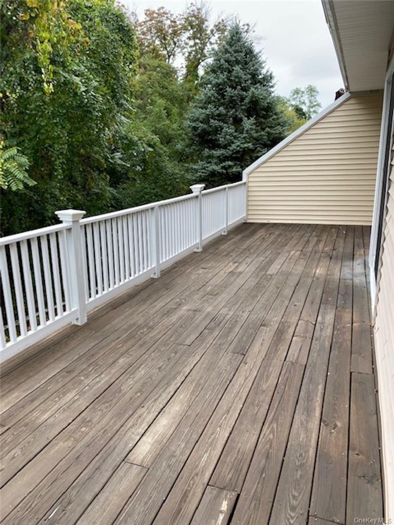 51 Winding Ridge Road White Plains, NY 10603 - Photo 23 of 30 a view of balcony with wooden floor