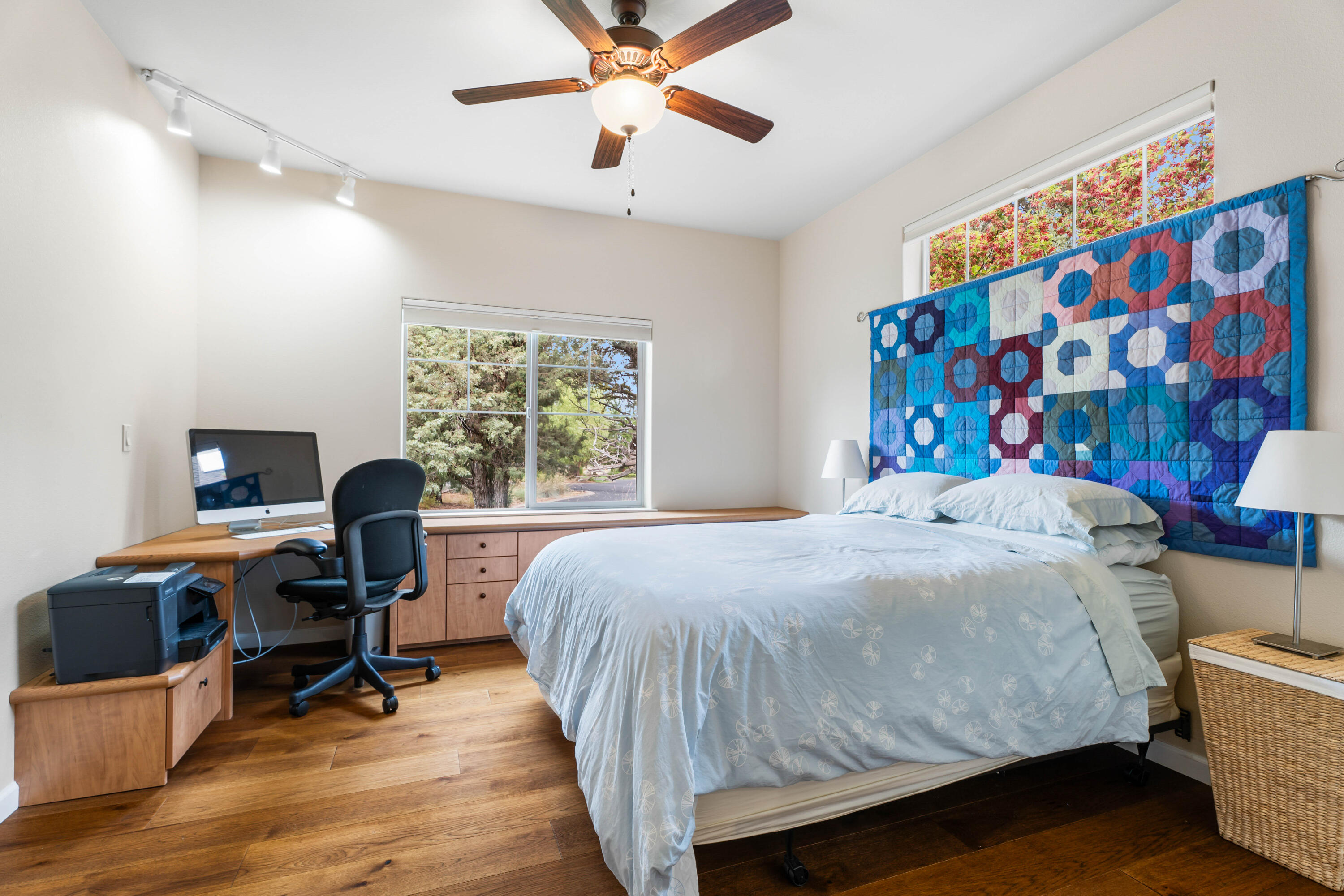 205 Vista Rim Drive Redmond, OR 97756 - Photo 21 of 85 a bedroom with a bed and a window