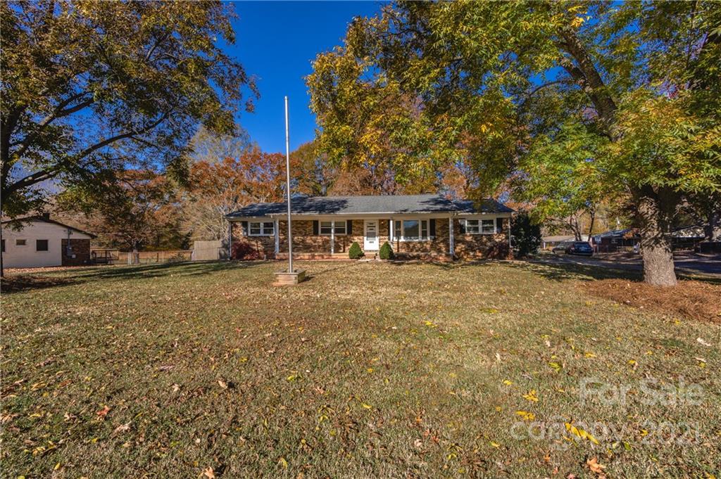 4003 Beaty Road Gastonia, NC 28056 - Photo 2 of 41 a front view of a house with a yard
