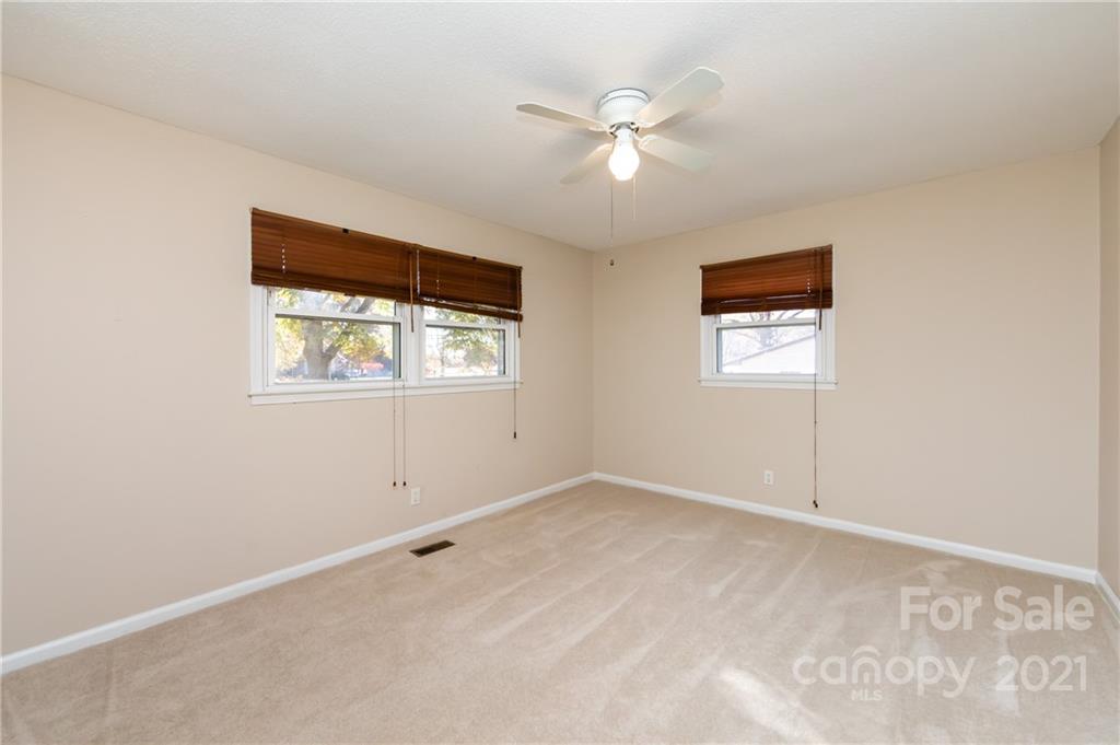 4003 Beaty Road Gastonia, NC 28056 - Photo 25 of 41 an empty room with windows and fan