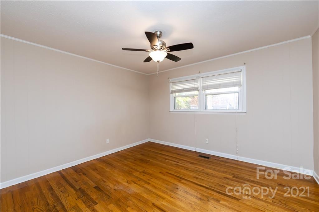 4003 Beaty Road Gastonia, NC 28056 - Photo 30 of 41 a view of empty room with wooden floor and fan