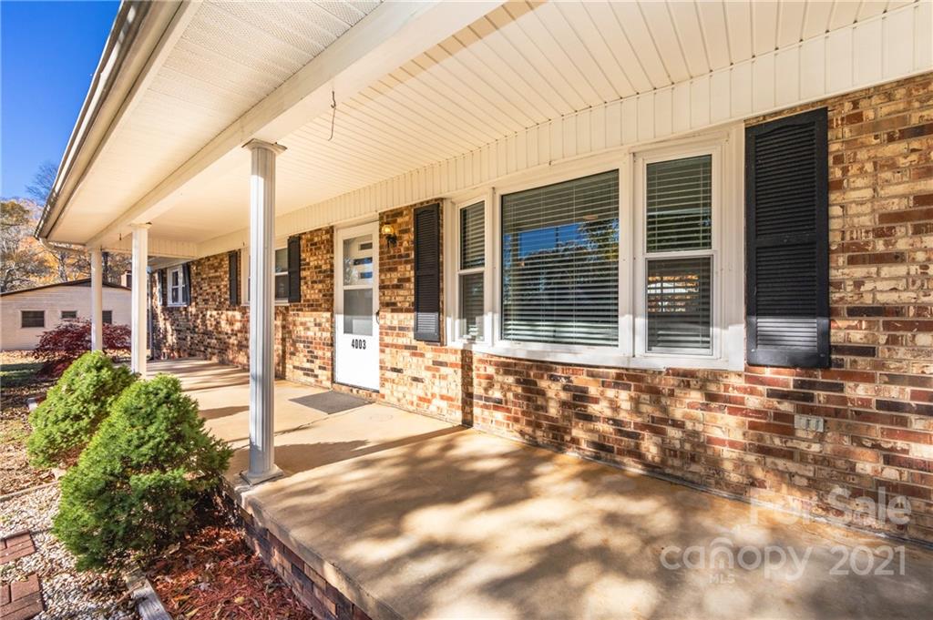 4003 Beaty Road Gastonia, NC 28056 - Photo 4 of 41 a view of a brick house with a large windows
