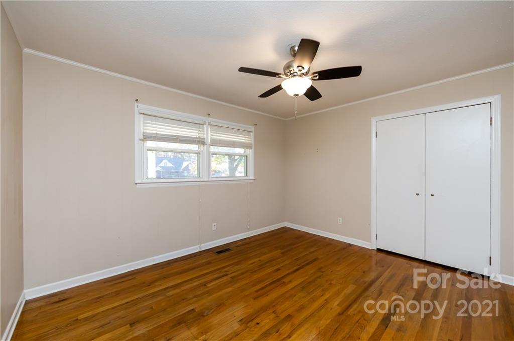 4003 Beaty Road Gastonia, NC 28056 - Photo 31 of 41 a view of empty room with wooden floor and fan