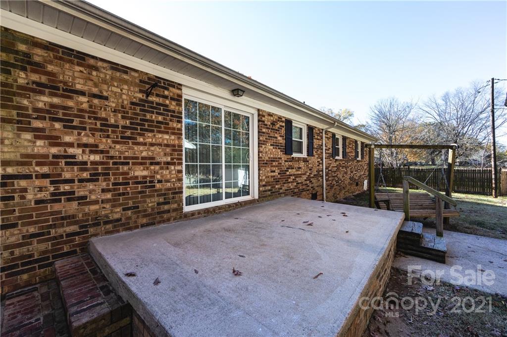 4003 Beaty Road Gastonia, NC 28056 - Photo 36 of 41 a view of a backyard with sitting area