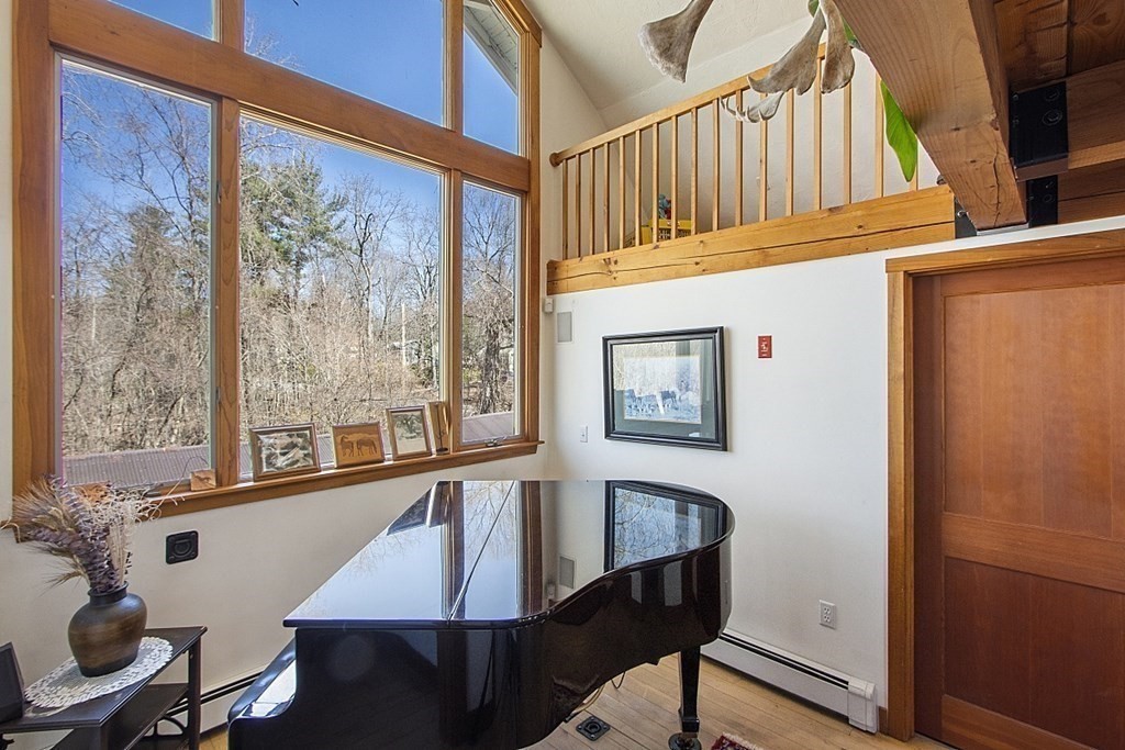 178 Wallace Hill Road Townsend, MA 01469 - Photo 12 of 42 a view of a balcony with furniture