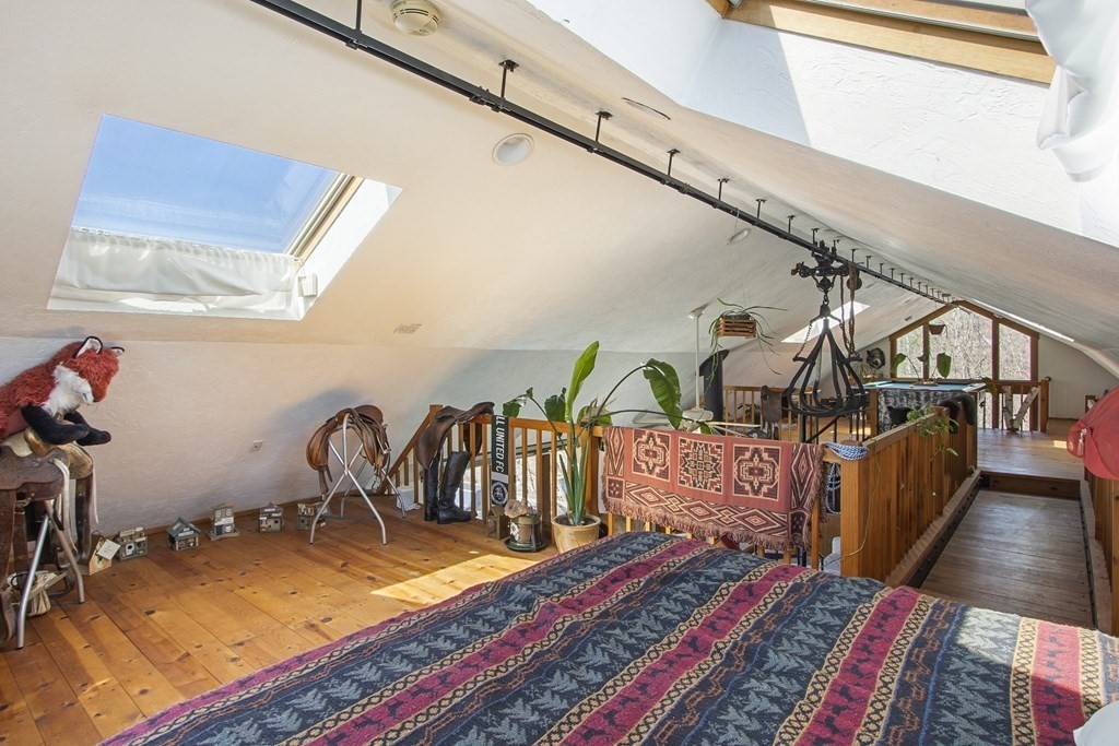 178 Wallace Hill Road Townsend, MA 01469 - Photo 20 of 42 a view of a room with gym equipment