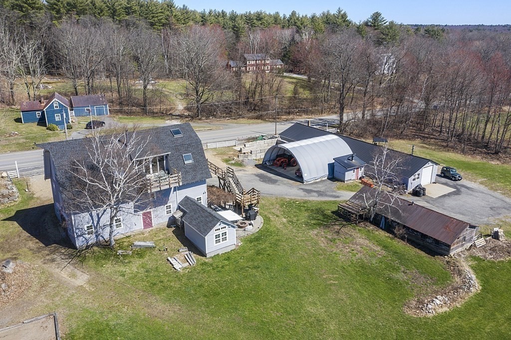 178 Wallace Hill Road Townsend, MA 01469 - Photo 2 of 42 a backyard of a house with outdoor seating