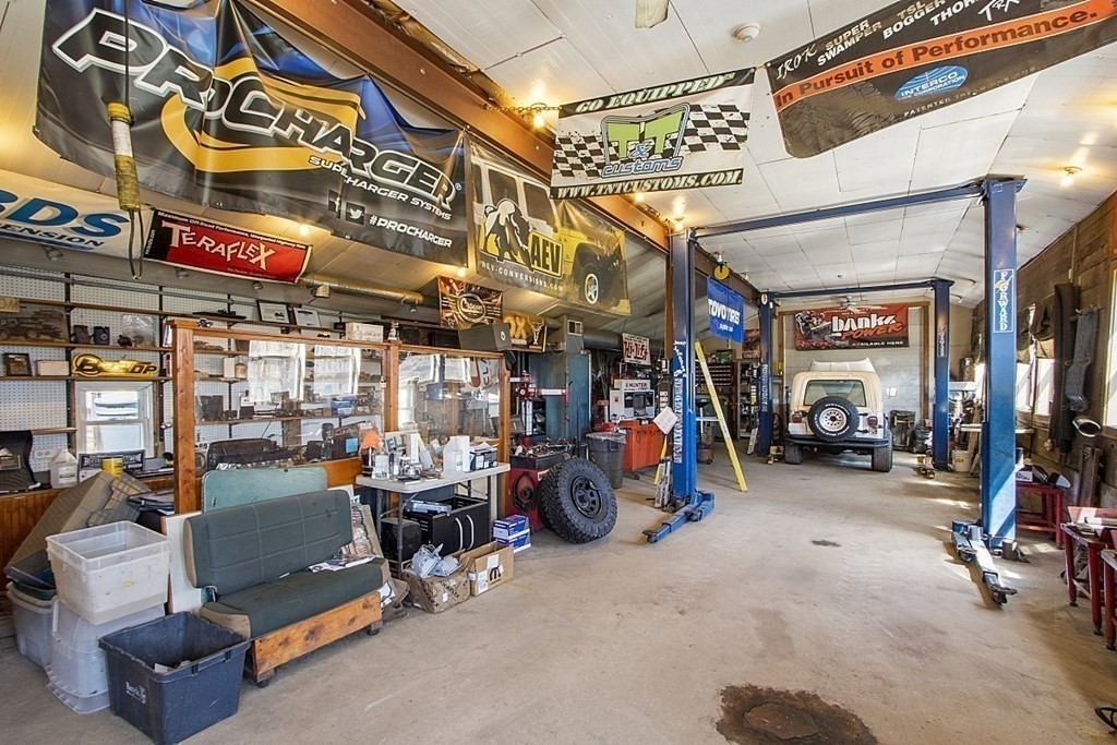 178 Wallace Hill Road Townsend, MA 01469 - Photo 29 of 42 a view of a storage room with a lot of stuff