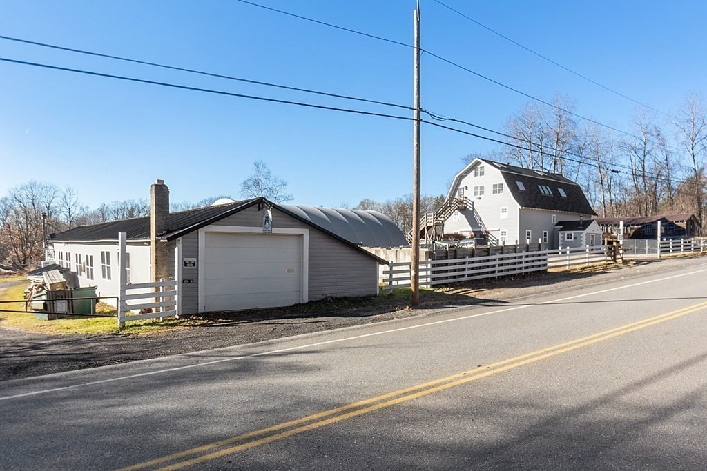 178 Wallace Hill Road Townsend, MA 01469 - Photo 3 of 42 a view of a couches in front of house