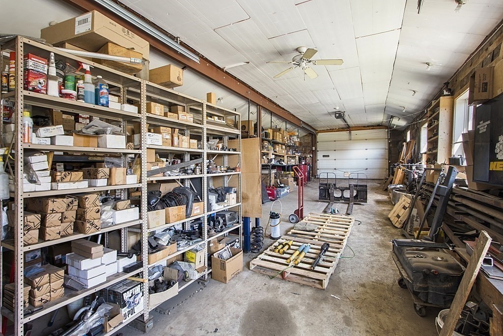 178 Wallace Hill Road Townsend, MA 01469 - Photo 31 of 42 a view of walk in closet with clothes and shoes