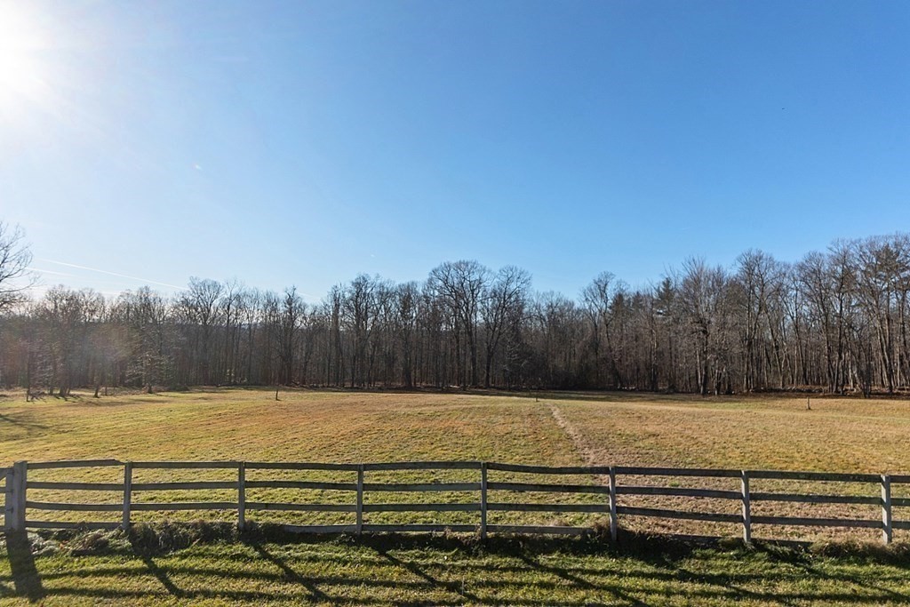 178 Wallace Hill Road Townsend, MA 01469 - Photo 36 of 42 a view of a yard with an outdoor space and seating area