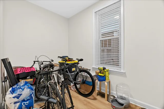 a view of bike storage next to a window