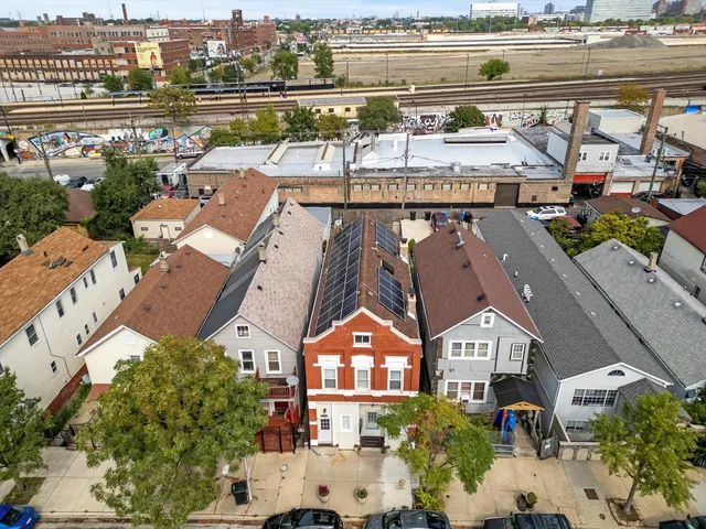 an aerial view of a city with lots of residential buildings