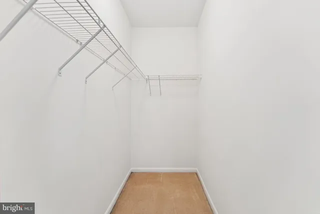 a view of a room with racks on the wall