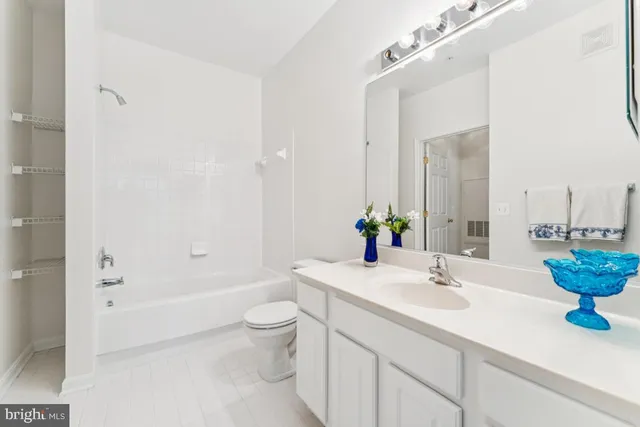 a bathroom with a sink and a bathtub
