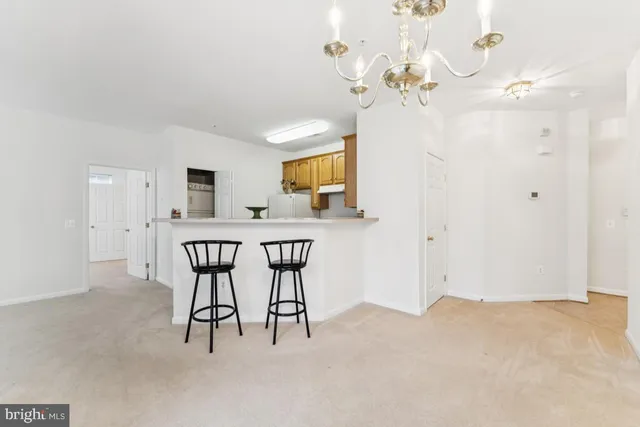a view of a livingroom with furniture and window