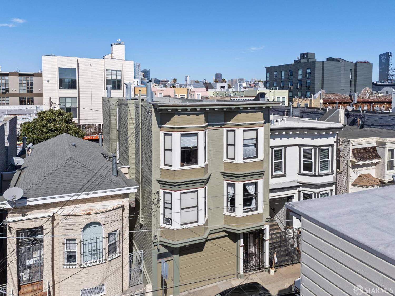 48 Sycamore Street San Francisco, CA 94110 - Photo 2 of 11 a view of city with tall buildings