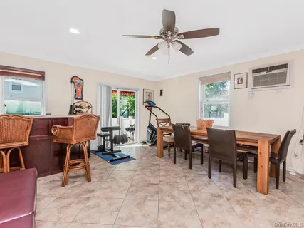 a work room with furniture and windows