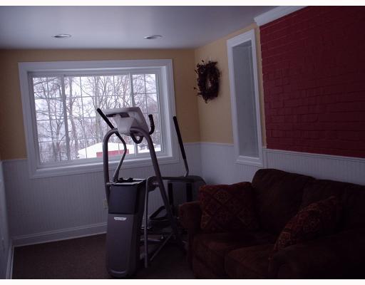 930 Ridge Road Ambridge, PA 15003 - Photo 8 of 16 Den/Family/Great Room. Airy and sunny room with multiple uses. Beige berber carpeting, bead board and nuetral walls. Ready to use!!