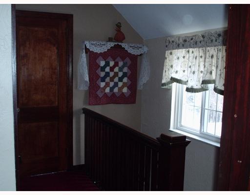 930 Ridge Road Ambridge, PA 15003 - Photo 10 of 16 Other. View from upper hallway showing stairwell with natural light from window.