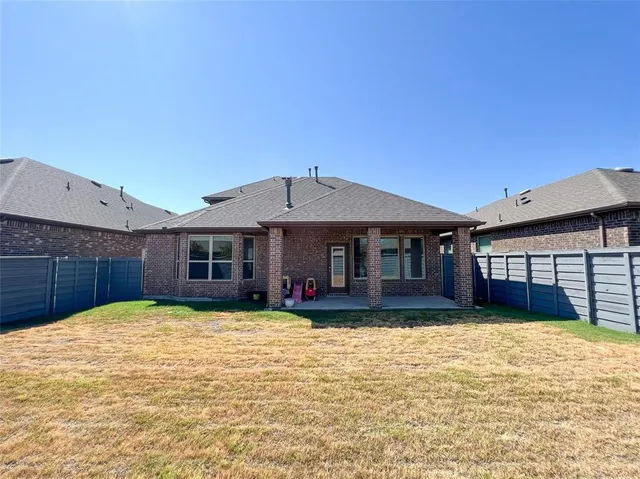 a view of swimming pool with a yard