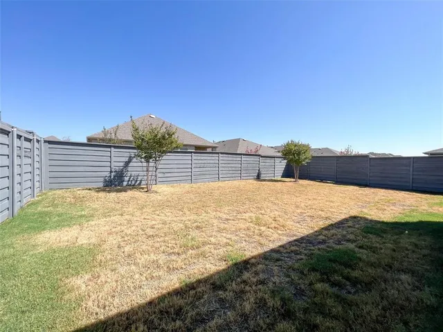 a house view with a outdoor space