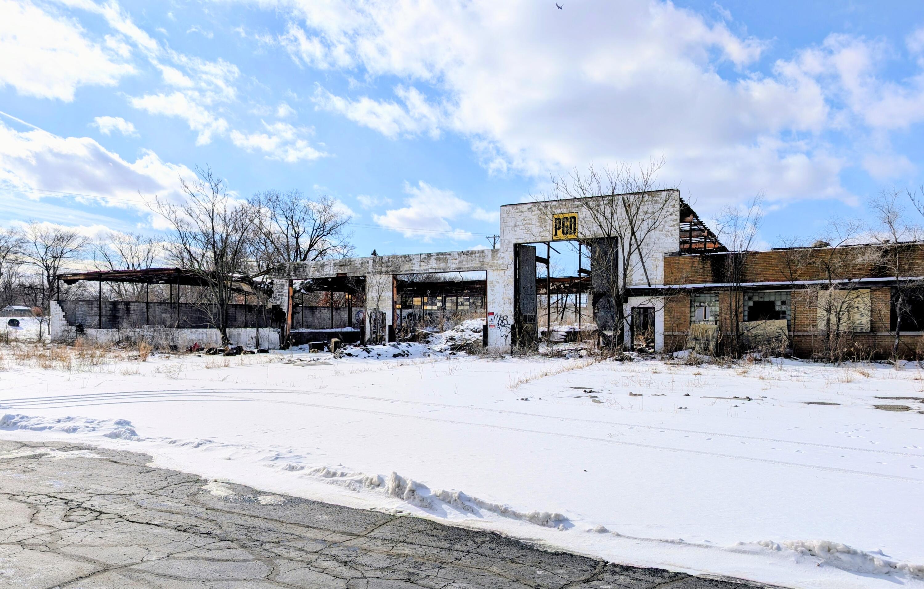 1301 West Ridge Road Gary, IN 46408 - Photo 4 of 5 a view of a house with snow on the road