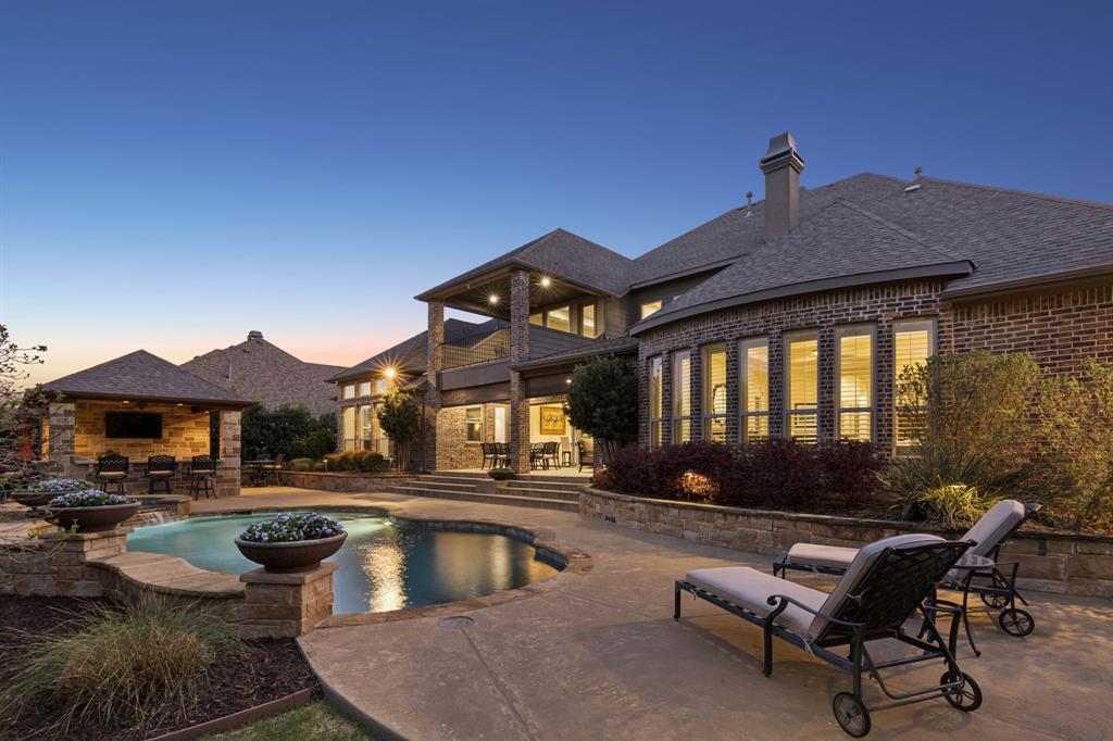 1005 Berkshire Road Southlake, TX 76092 - Photo 36 of 40 a view of a house with swimming pool and sitting area