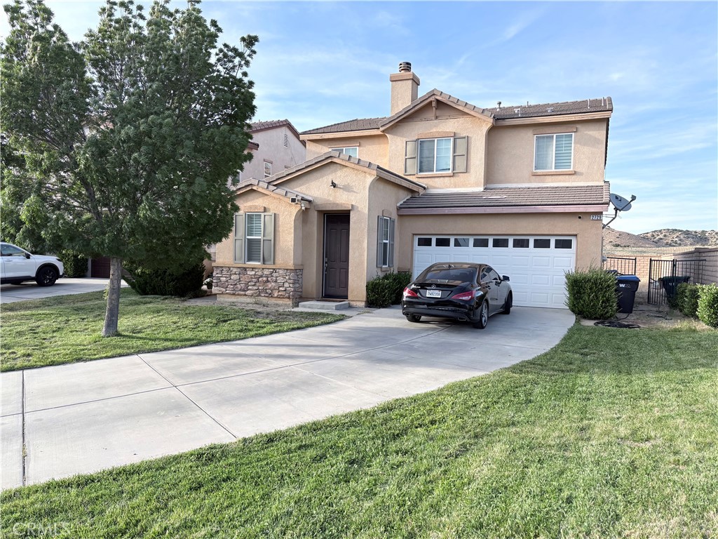 2729 Hornbeam Road Palmdale, CA 93551 - Photo 1 of 35 a house view with a garden space