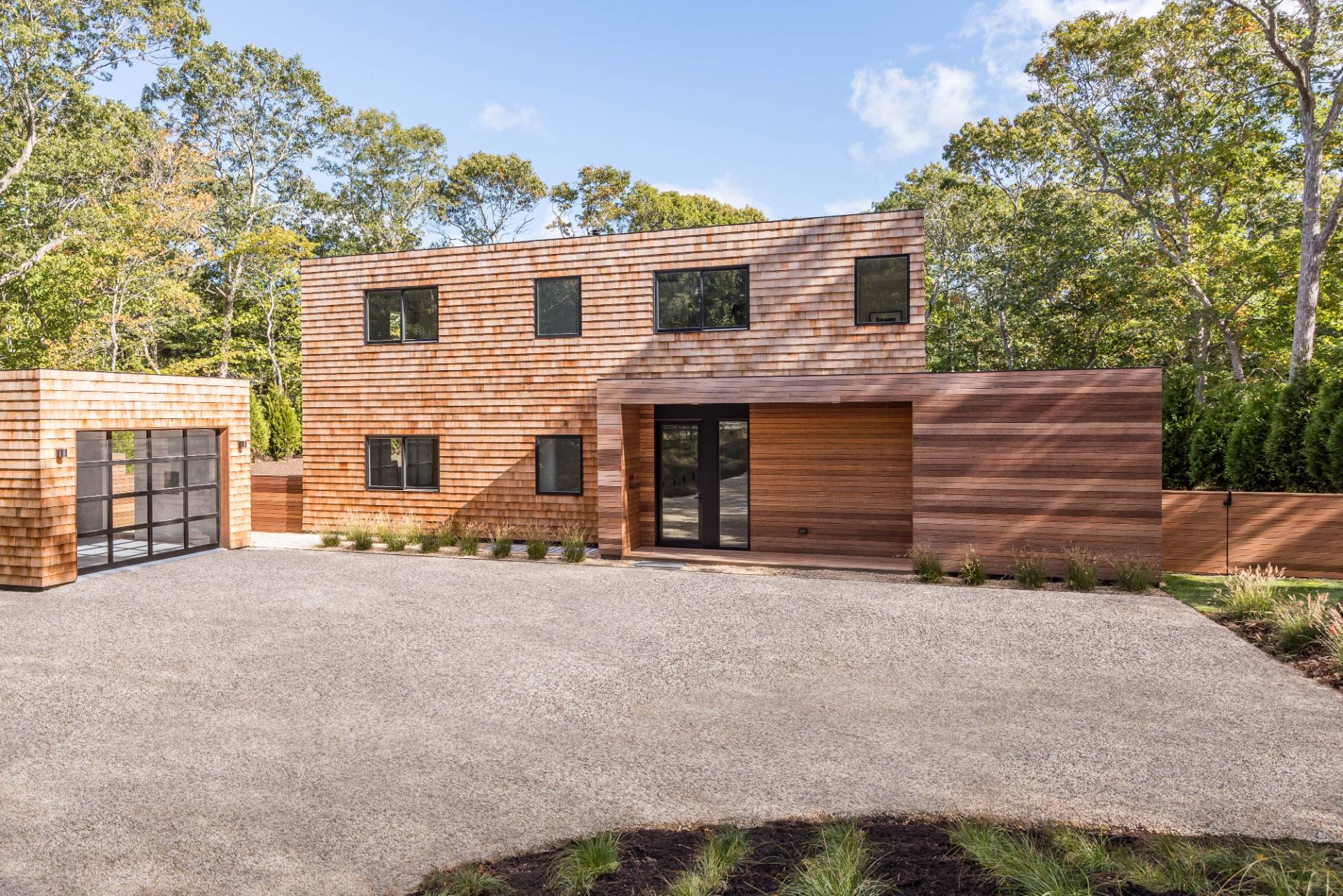 2 Semaphore Road East Hampton, NY 11937 - Photo 1 of 37 a front view of a house with a yard