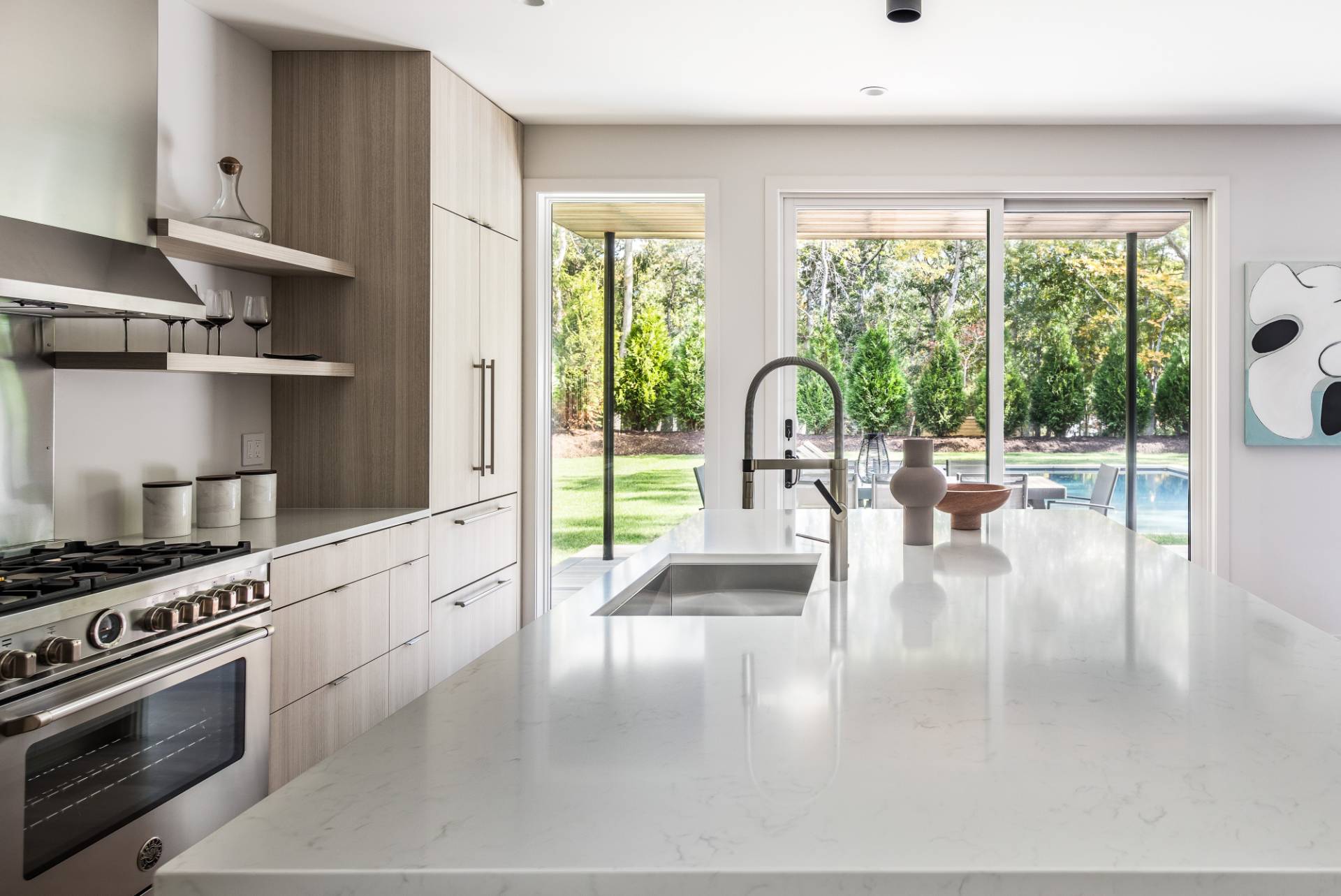 2 Semaphore Road East Hampton, NY 11937 - Photo 14 of 37 a kitchen with a stove a refrigerator a sink and living room view