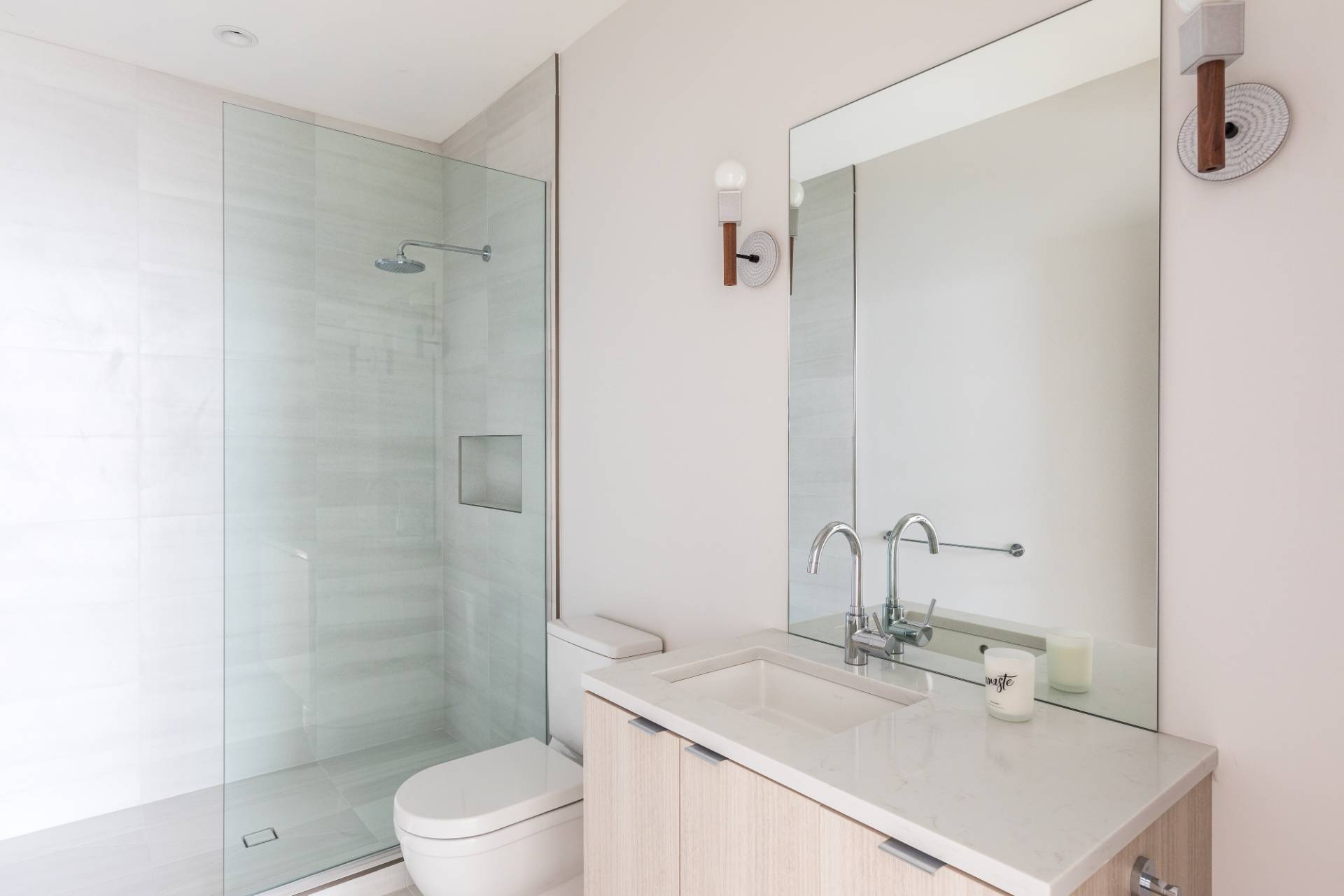 2 Semaphore Road East Hampton, NY 11937 - Photo 16 of 37 a bathroom with a sink toilet and shower