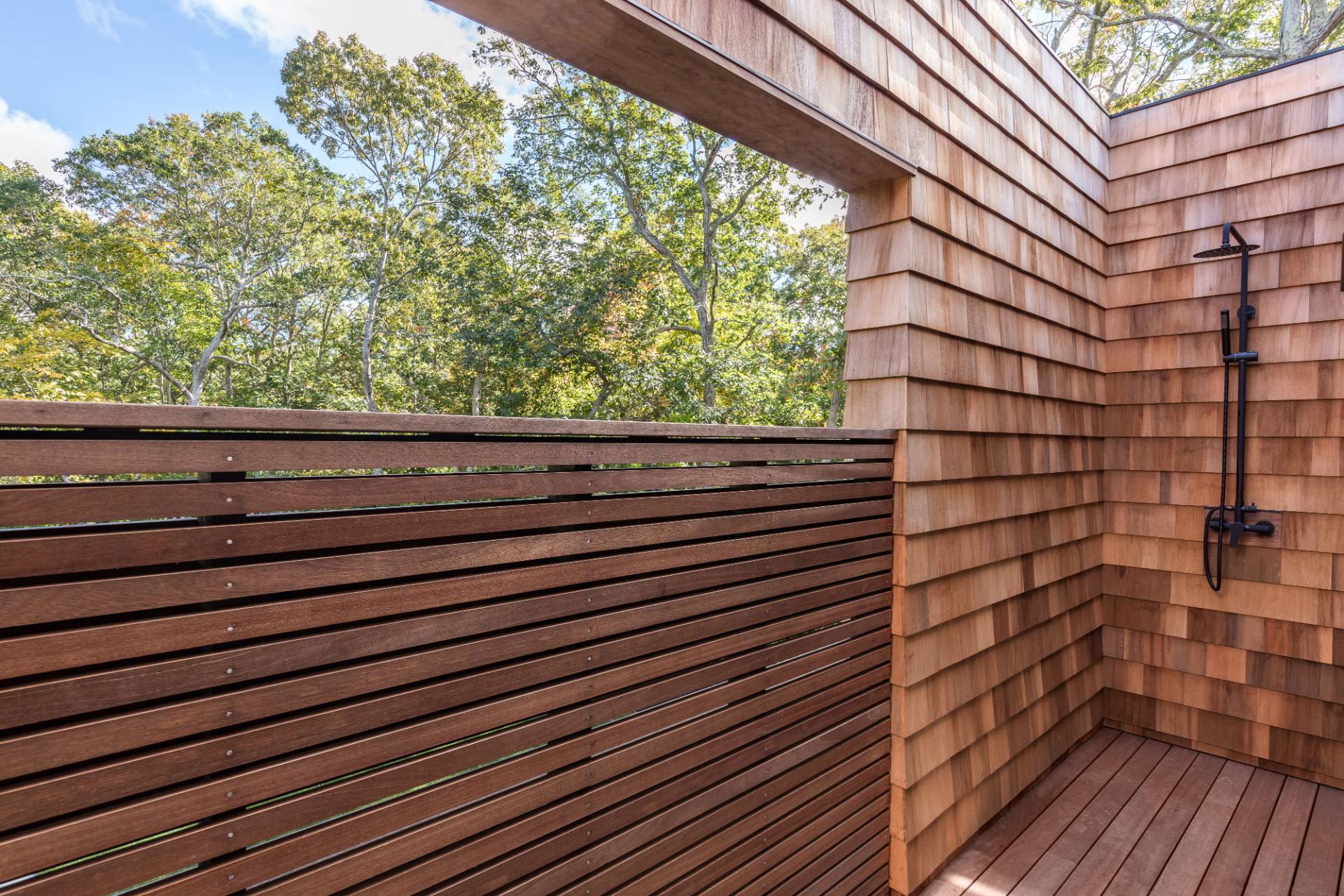 2 Semaphore Road East Hampton, NY 11937 - Photo 21 of 37 a view of a wooden balcony with an outdoor space