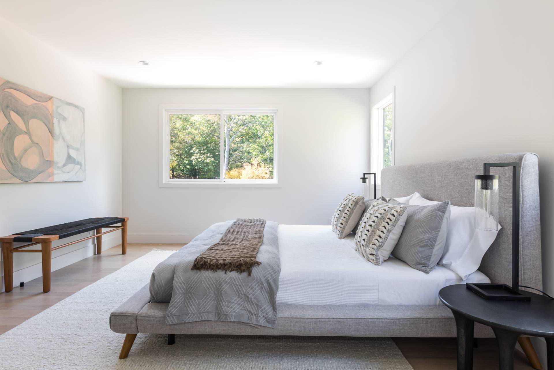 2 Semaphore Road East Hampton, NY 11937 - Photo 23 of 37 a bedroom with a bed and a chair