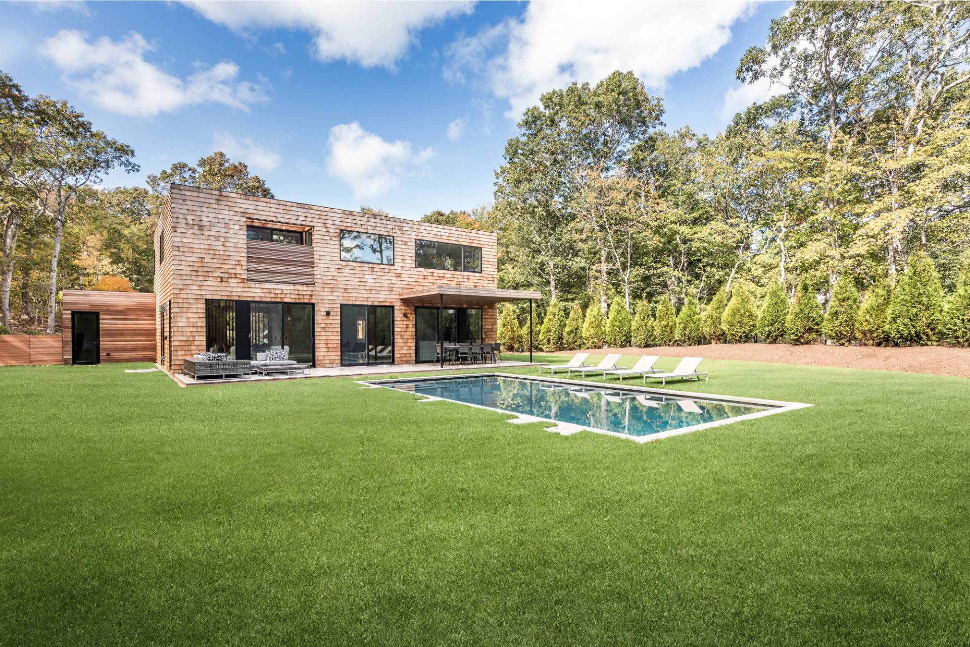 2 Semaphore Road East Hampton, NY 11937 - Photo 3 of 37 a view of an house with swimming pool and yard