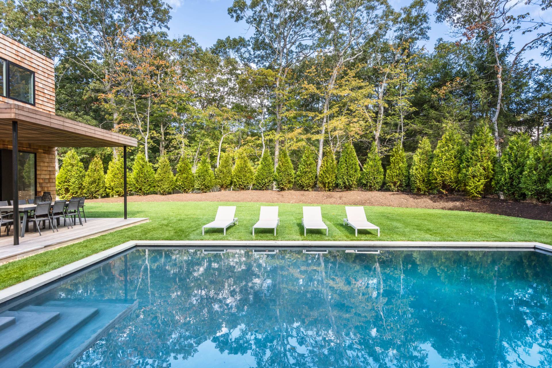 2 Semaphore Road East Hampton, NY 11937 - Photo 34 of 37 a view of yard with swimming pool and trees