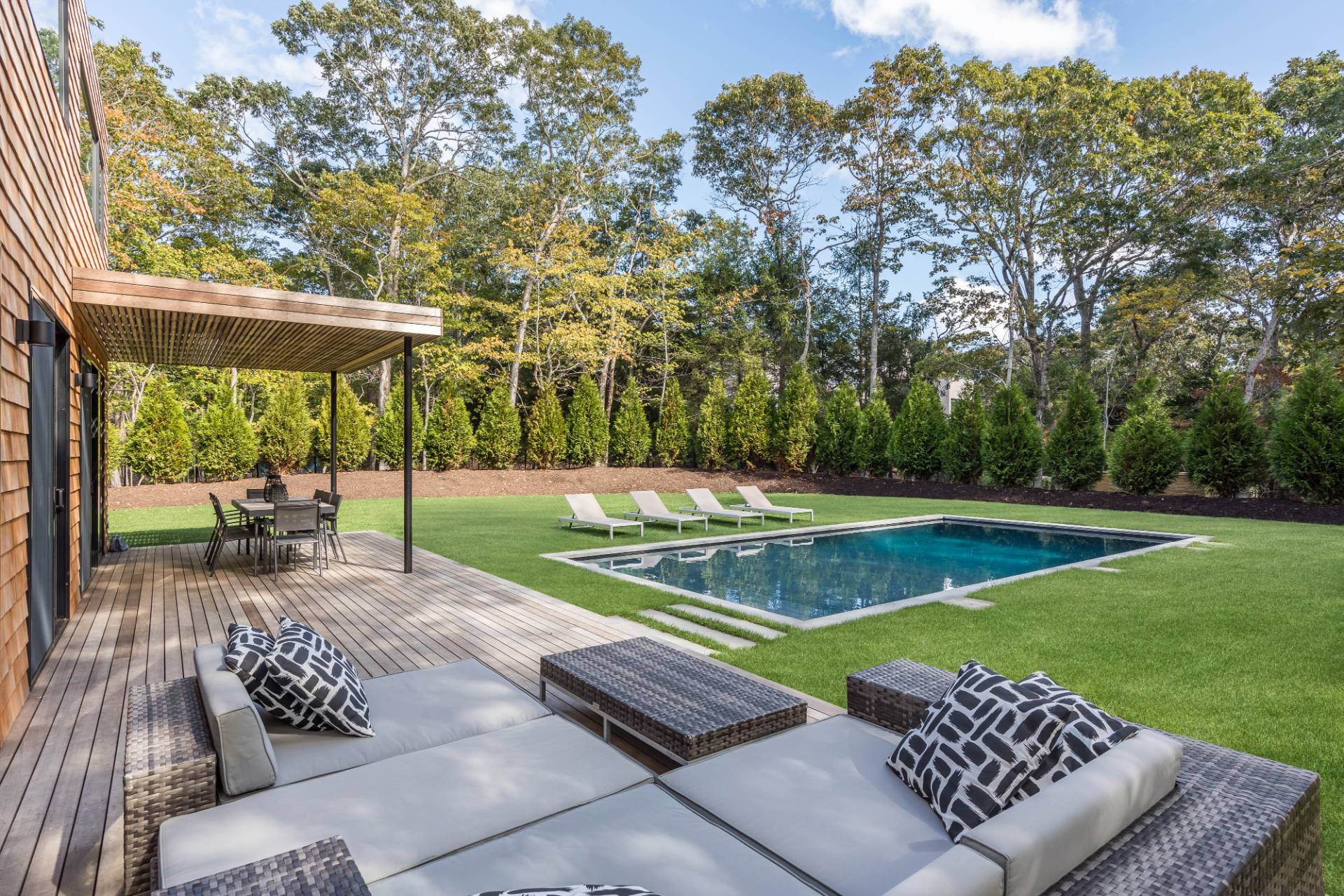2 Semaphore Road East Hampton, NY 11937 - Photo 5 of 37 a view of a backyard with a garden