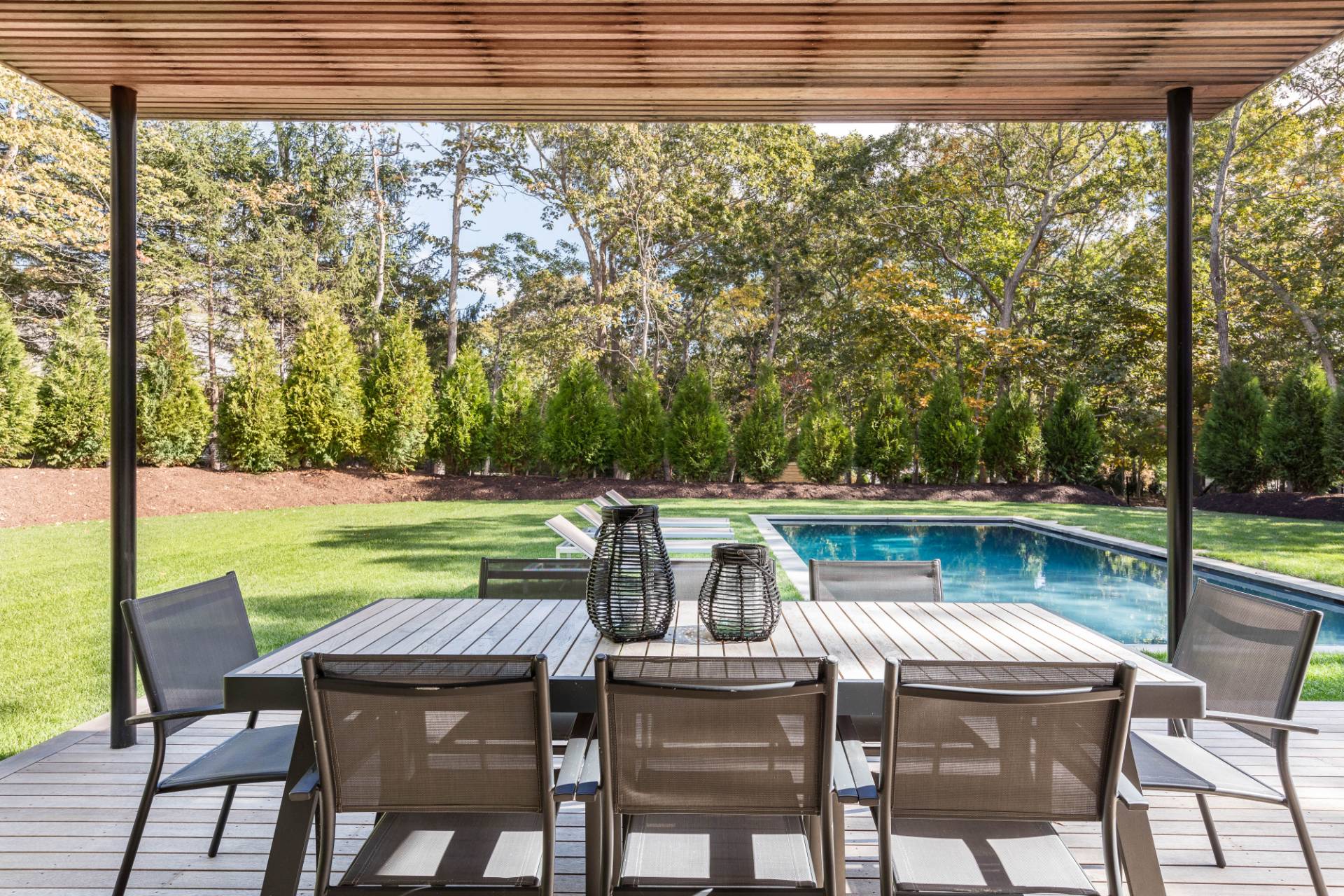 2 Semaphore Road East Hampton, NY 11937 - Photo 6 of 37 a view of backyard with seating area and green space