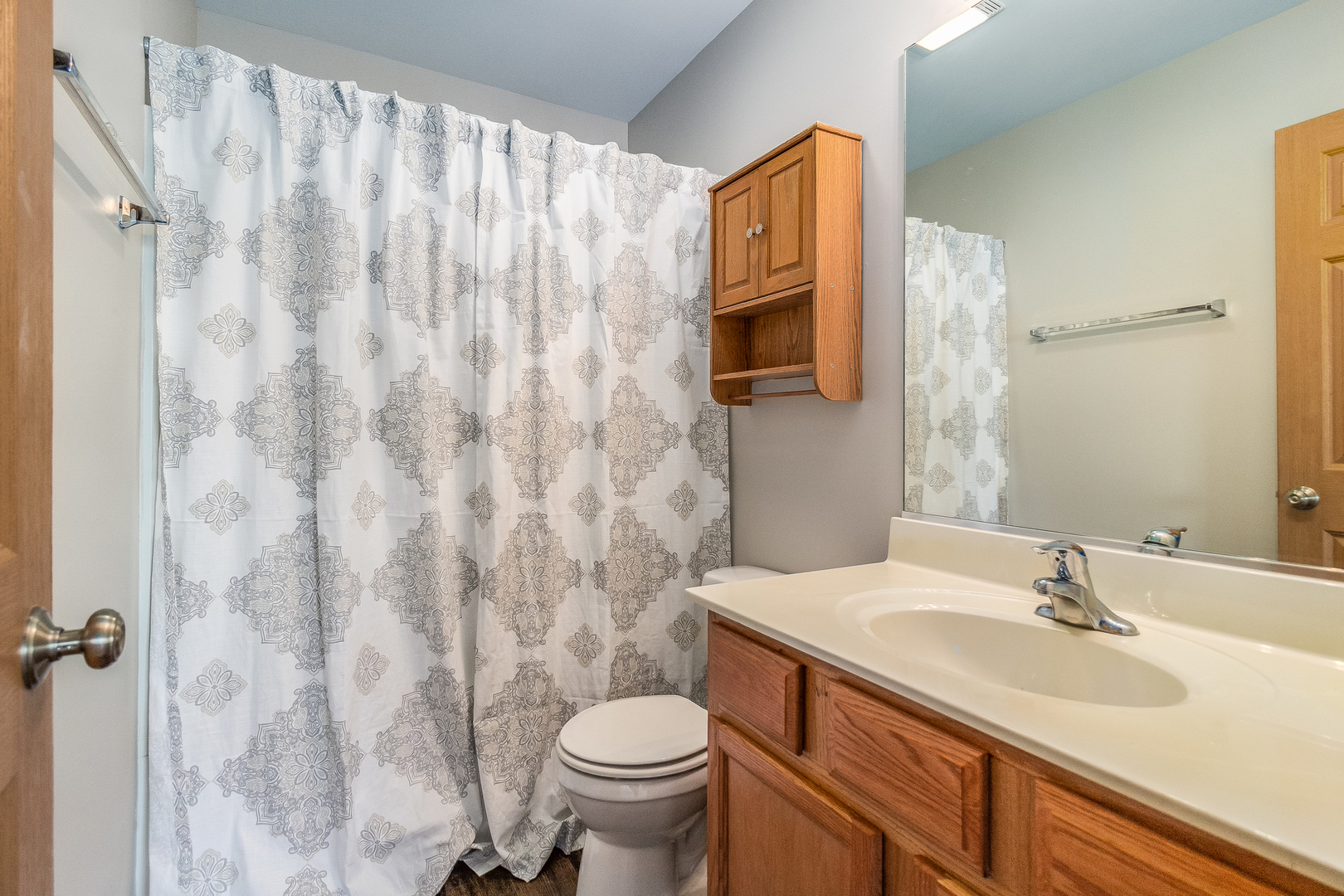3863 Bailey Road Yorkville, IL 60560 - Photo 11 of 20 a bathroom with a sink toilet and shower